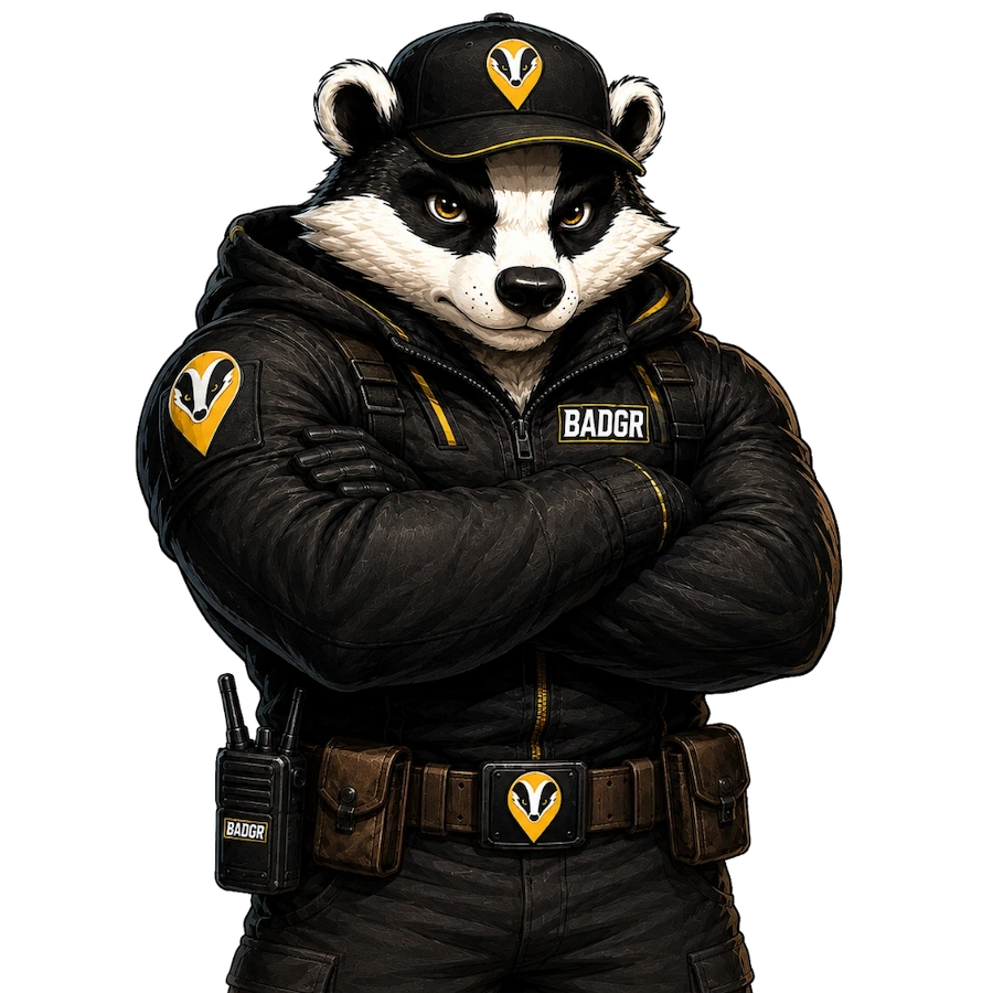 Mad Badger Marketing Defender mascot standing with arms crossed
